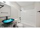 Bathroom featuring a modern vessel sink, shower, and toilet at 4737 E Belleview St, Phoenix, AZ 85008