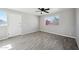 Bright living room featuring tile floors and a large window at 4737 E Belleview St, Phoenix, AZ 85008