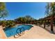 Inviting community pool with a covered patio area perfect for relaxing on sunny days at 5345 E Van Buren St # 308, Phoenix, AZ 85008