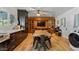 Open concept kitchen with wood accents and view of entertainment center at 5809 W Morten Ave, Glendale, AZ 85301