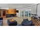 Cozy living room features a fireplace, built-in shelving, and sliding glass doors to the backyard at 5809 W Morten Ave, Glendale, AZ 85301