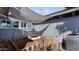 Enclosed garden area with raised planting beds and sun shade structure at 5809 W Morten Ave, Glendale, AZ 85301
