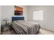 Cozy bedroom featuring a comfortable bed, natural light, and a soothing atmosphere for restful nights at 607 W Palo Verde St, Gilbert, AZ 85233