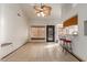 Open concept dining area featuring tiled floors, counter seating, and access to the patio at 607 W Palo Verde St, Gilbert, AZ 85233