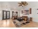 Bright living room boasts stylish furniture, a large patterned rug, and a decorative glass front door at 607 W Palo Verde St, Gilbert, AZ 85233