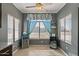 Breakfast nook with a large window and blue patterned curtains at 7079 S Kachina Dr, Tempe, AZ 85283