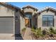 Inviting front entrance with well-manicured landscaping and charming architectural details at 7079 S Kachina Dr, Tempe, AZ 85283