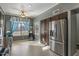 Kitchen with stainless steel refrigerator and an adjacent breakfast nook at 7079 S Kachina Dr, Tempe, AZ 85283