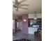 Cozy kitchen featuring tiled floors, a ceiling fan, and stainless steel appliances at 8020 E Thomas Rd # 313, Scottsdale, AZ 85251