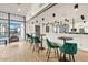 Beautiful community space with comfortable seating and well-lit bar area with modern decor at 8055 E Thomas Rd # A102, Scottsdale, AZ 85251