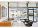Modern community lobby with stylish seating and expansive glass windows at 8055 E Thomas Rd # A102, Scottsdale, AZ 85251