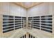 Home sauna featuring light-colored wooden walls, benches and ladder for relaxation and wellness at 8055 E Thomas Rd # A102, Scottsdale, AZ 85251