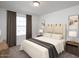 Well-lit primary bedroom with neutral-toned walls and carpet featuring a comfortable mattress and elegant decor at 9832 W Agora Ln, Tolleson, AZ 85353