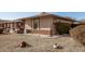 Charming single-story home featuring a stone accent wall and a well-maintained gravel yard at 9910 W Gulf Hills Dr, Sun City, AZ 85351