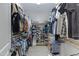 Spacious walk-in closet with ample storage, shelving, and hanging space for clothing and shoes at 10721 W Jefferson St, Avondale, AZ 85323