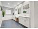 Spacious bathroom with dual vanities, modern fixtures, and hexagonal tile flooring at 11673 N 136Th St # 1019, Scottsdale, AZ 85259