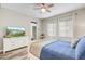 Comfortable bedroom featuring a queen bed, neutral tones, and ample natural light at 11673 N 136Th St # 1019, Scottsdale, AZ 85259