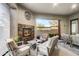 Inviting outdoor patio area with a stone fireplace and comfortable seating, ideal for gatherings at 11673 N 136Th St # 1019, Scottsdale, AZ 85259