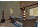 A well-designed outdoor patio with a fire pit, comfortable seating, and attractive decor elements at 11673 N 136Th St # 1019, Scottsdale, AZ 85259