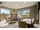 An outdoor living space featuring a fireplace, seating, and plenty of natural light at 11673 N 136Th St # 1019, Scottsdale, AZ 85259