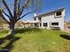 Inviting backyard with a lush green lawn and ample space for outdoor activities at 12403 W Monte Vista Rd Rd, Avondale, AZ 85392