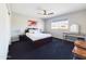 Bright bedroom featuring a large window at 12403 W Monte Vista Rd Rd, Avondale, AZ 85392