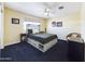 Spacious bedroom featuring modern bed frame and storage at 12403 W Monte Vista Rd Rd, Avondale, AZ 85392