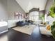 Inviting living room with vaulted ceilings, large windows, comfortable seating, and modern decor at 12403 W Monte Vista Rd Rd, Avondale, AZ 85392
