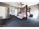 Elegant main bedroom featuring a four-poster bed and open access to the ensuite at 12403 W Monte Vista Rd Rd, Avondale, AZ 85392