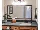 Bathroom sink with granite countertop and framed mirror at 12448 N 76Th St, Scottsdale, AZ 85260