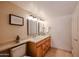 Bathroom featuring double sinks, tile floors, and modern fixtures at 12448 N 76Th St, Scottsdale, AZ 85260