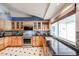 Updated kitchen featuring custom cabinets, stainless steel appliances and designer backsplash at 12448 N 76Th St, Scottsdale, AZ 85260