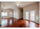 Open living room with hardwood floors and natural light at 12448 N 76Th St, Scottsdale, AZ 85260