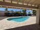 Inviting pool with stone surround in a private backyard setting, perfect for outdoor relaxation and entertainment at 12448 N 76Th St, Scottsdale, AZ 85260