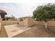 Backyard shed and concrete patio, enhanced by low maintenance landscaping, plus extra room for activities at 12448 N 76Th St, Scottsdale, AZ 85260