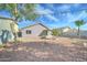 Picturesque backyard offering privacy, low-maintenance landscaping, and perfect for enjoying outdoor living at 12621 W Aster Dr, El Mirage, AZ 85335