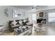 Bright living room with tile floors, comfortable seating, and stylish decor, perfect for relaxation and gatherings at 12621 W Aster Dr, El Mirage, AZ 85335
