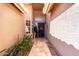 Inviting entryway with tiled floor, high ceiling, and a decorative front door at 1350 N Alexis Dr, Gilbert, AZ 85234