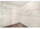 A bright walk-in closet with wire shelving for optimal storage and organization at 14013 N 57Th Pl, Scottsdale, AZ 85254