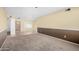 Spacious living room featuring neutral tones, carpet, and tile flooring, with a chandelier and natural light at 14013 N 57Th Pl, Scottsdale, AZ 85254