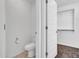 Bathroom featuring a toilet and access to a walk-in closet at 14247 W Bronco Trl, Surprise, AZ 85387