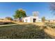 Spacious backyard includes a large storage building and plenty of room to roam at 14251 N 182Nd Ave, Surprise, AZ 85388