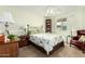 Cozy bedroom with a ceiling fan, comfortable bed, and a bright window at 14251 N 182Nd Ave, Surprise, AZ 85388