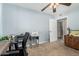 Bedroom with a desk, carpet flooring, and a view into the hallway at 14251 N 182Nd Ave, Surprise, AZ 85388