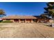 A well maintained single story home with a well manicured front yard at 14251 N 182Nd Ave, Surprise, AZ 85388
