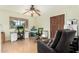 Office with tile flooring, ceiling fan, and outdoor view at 14251 N 182Nd Ave, Surprise, AZ 85388