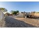 Wide-open parking area that can accommodate many vehicles and trailers at 14251 N 182Nd Ave, Surprise, AZ 85388