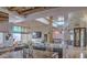 Spacious open kitchen featuring stone accents, granite countertops, and stainless steel appliances at 16325 N Borrego Trl, Fountain Hills, AZ 85268