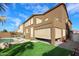 Exterior showcasing the pool, spa, and covered patio area, perfect for outdoor living at 17641 W Corrine Dr, Surprise, AZ 85388