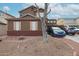 Charming two-story home featuring shutters, and easy to maintain landscaping at 17641 W Corrine Dr, Surprise, AZ 85388